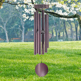 ASTARIN campanas de viento frente broncíneo mostrando diseño y presencia decorativa