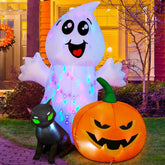 COMIN inflable frontal mostrando fantasma gato y calabaza, decoración visible