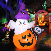 COMIN vista frontal del inflable mostrando calabaza fantasma y gato iluminado, atractivo visual