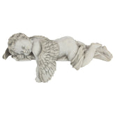 Design Toscano ángel dormido frontal mostrando serenidad y acabado piedra