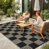 Garvee vista frontal de la alfombra 5x8 mostrando diseño a cuadros y beneficio estético