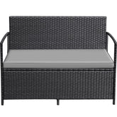 Greesum loveseat vista frontal mostrando diseño negro y cojines rojos, aporta confort exterior