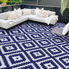 Alfombra Mattitude frente 8'x10' azul mostrando patrón y color duradero