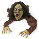 PREXTEX zombi frontal en jardín mostrando realismo y efecto sorpresa