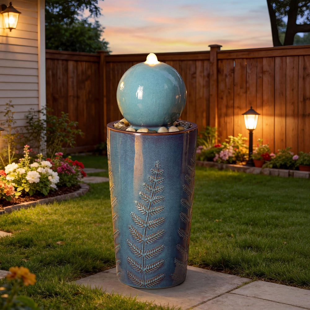 Ultym fuente esfera vista frontal con acabado azul teal, aporta elegancia exterior
