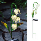 VCUTEKA vista frontal de la lámpara solar mostrando flor de cristal y brillo decorativo