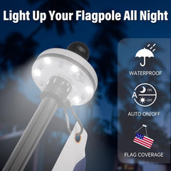 ZMTECH foco solar integrado iluminando bandera por la noche