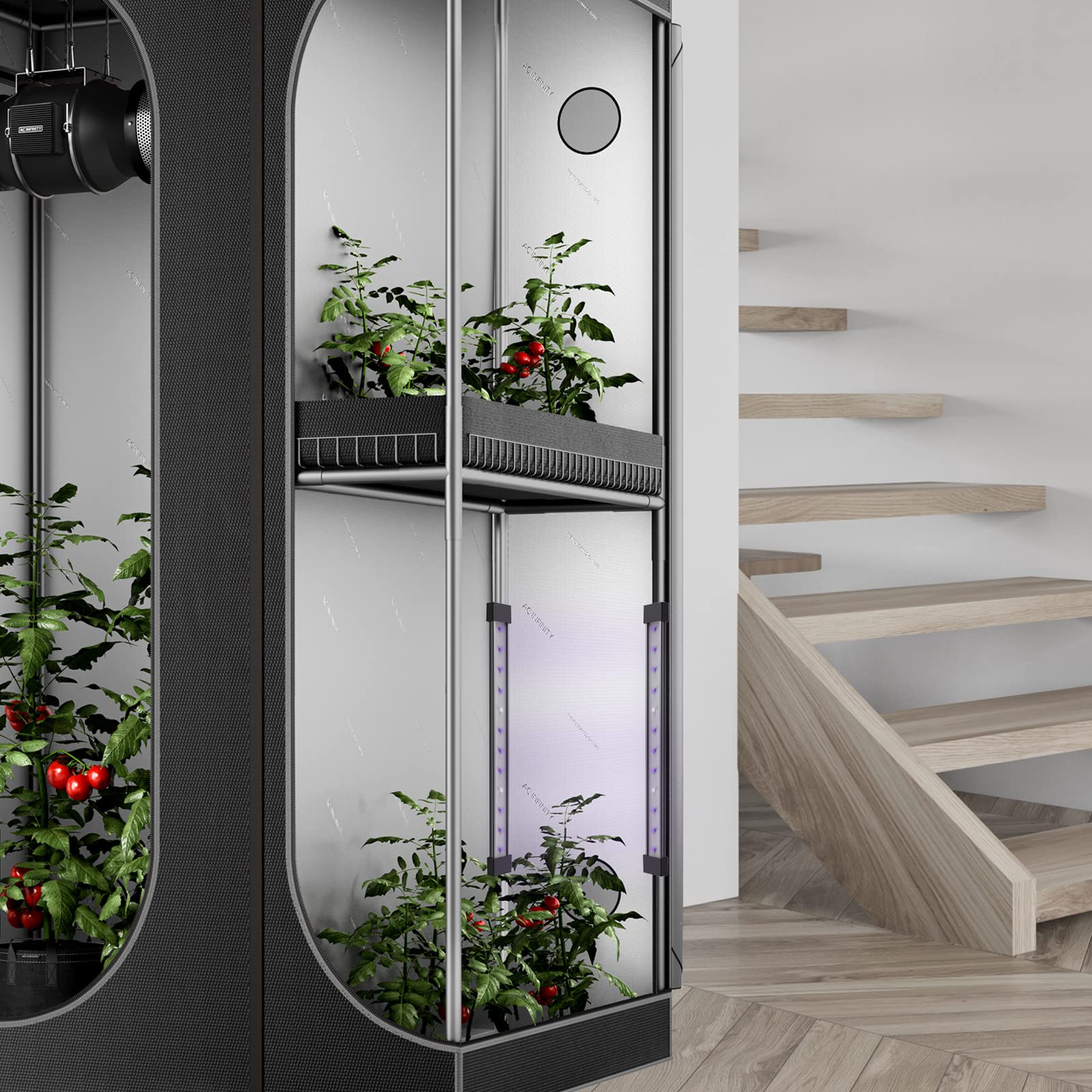 AC Infinity IONBEAM U2 al lado de regla para comparar tamaño compacto y portabilidad