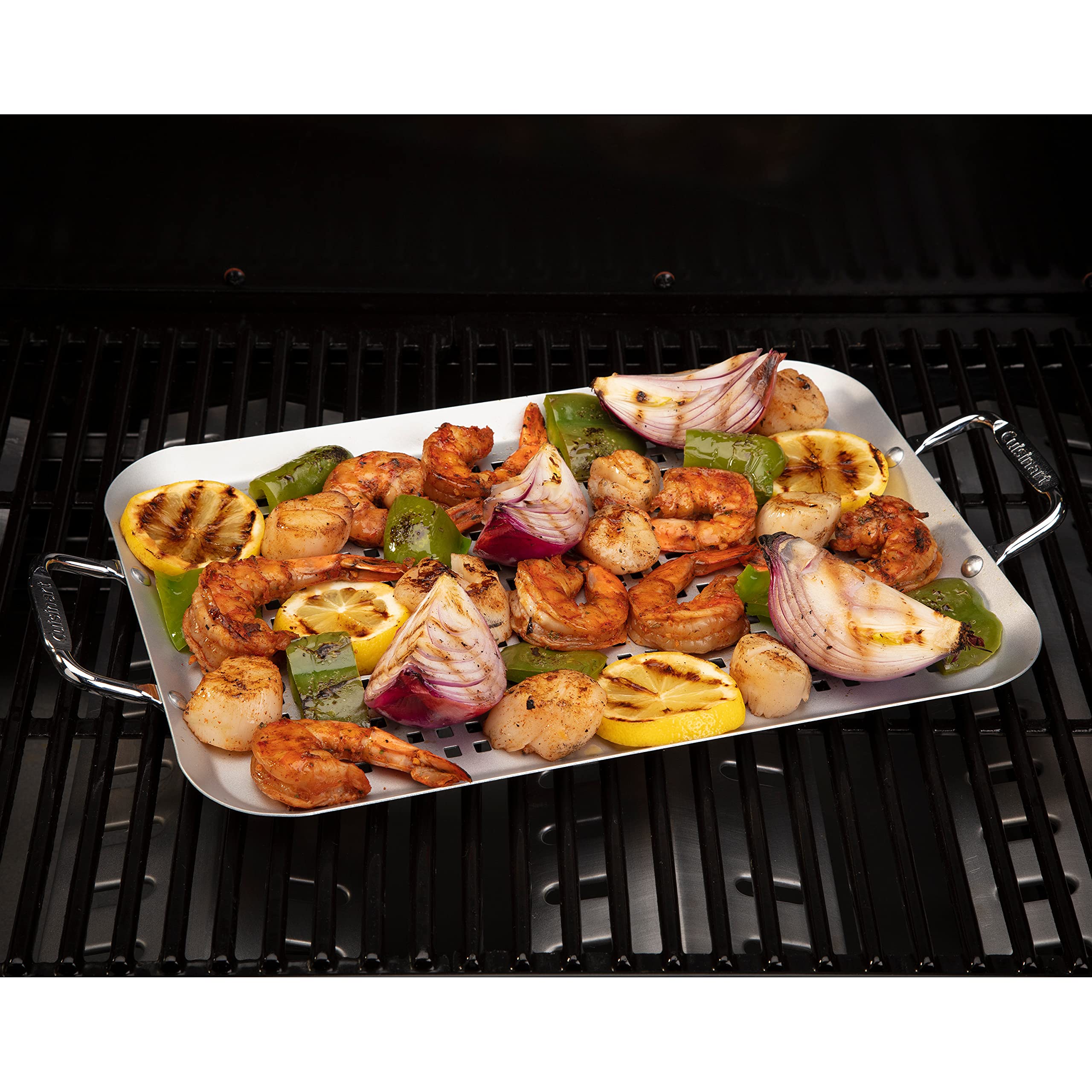 Cuisinart CNP-650 en parrilla con verduras y pescado, cocina uniforme y limpia