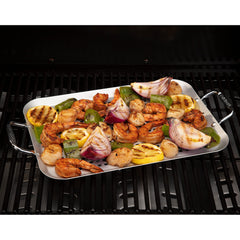 Cuisinart CNP-650 en parrilla con verduras y pescado, cocina uniforme y limpia