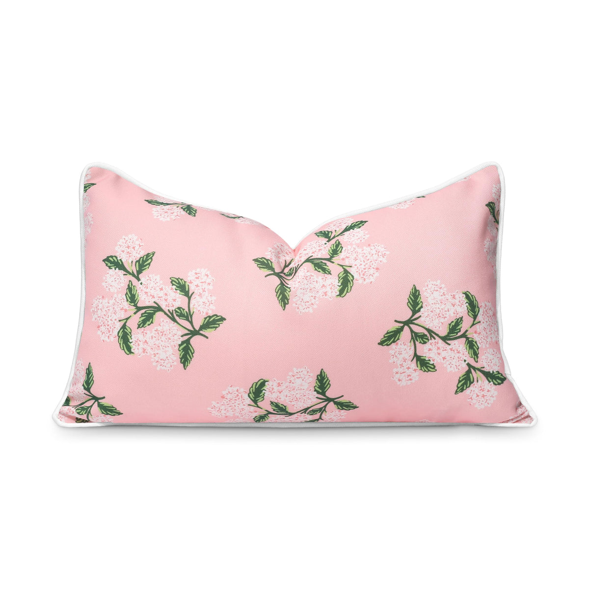 Hofdeco Premium vista frontal de la funda lumbar hortensia blush valorizando sofá